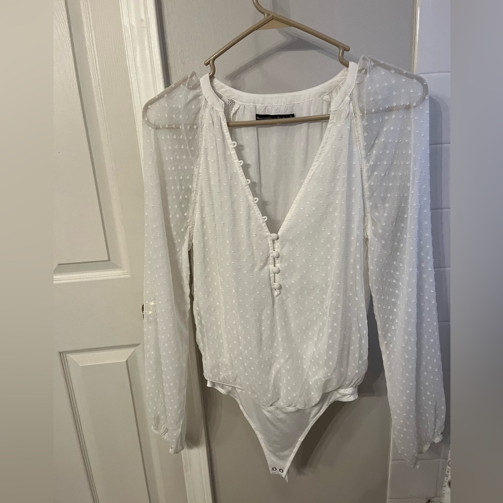 Eyelet Long Sleeve Bodysuit
